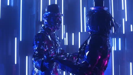 Silver-couple-of-people-in-love-dance-together-and-rotate-in-neon-light
